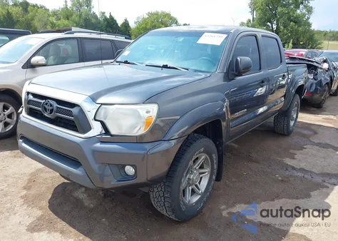 2014 Toyota Tacoma Base V6 z USA, uszkodzony, nr VIN 3TMLU4EN6EM163642